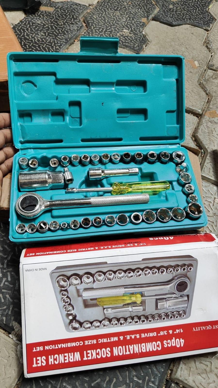 40 piece socket wrench set in teal plastic case including ratchet, extension bars, and screwdriver handle