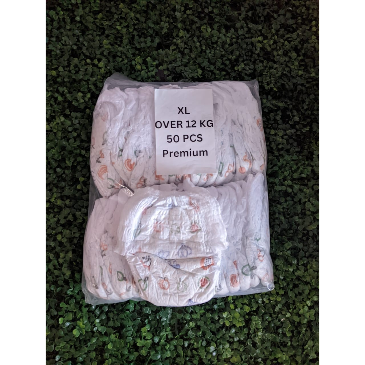 Pack of affordable baby diapers XL, 50 pieces, designed for comfort and durability for babies over 12 kg