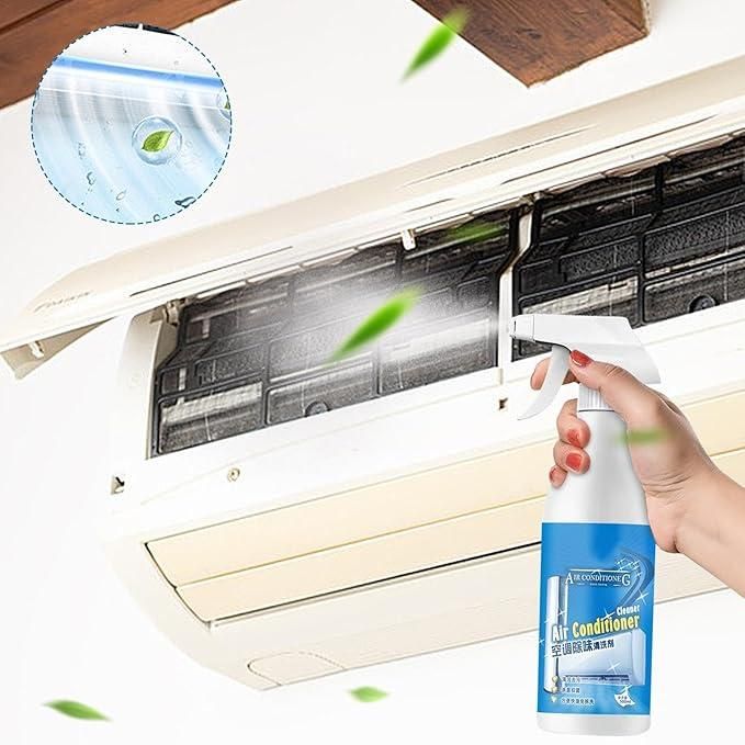 THE GIR FARMER air conditioner cleaner spray being used to clean inside of a wall-mounted air conditioner unit