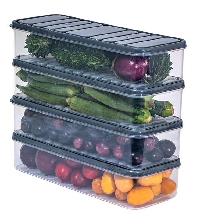 The Gir Farmer airtight fridge vegetable storage box with stacked transparent containers holding assorted fresh vegetables