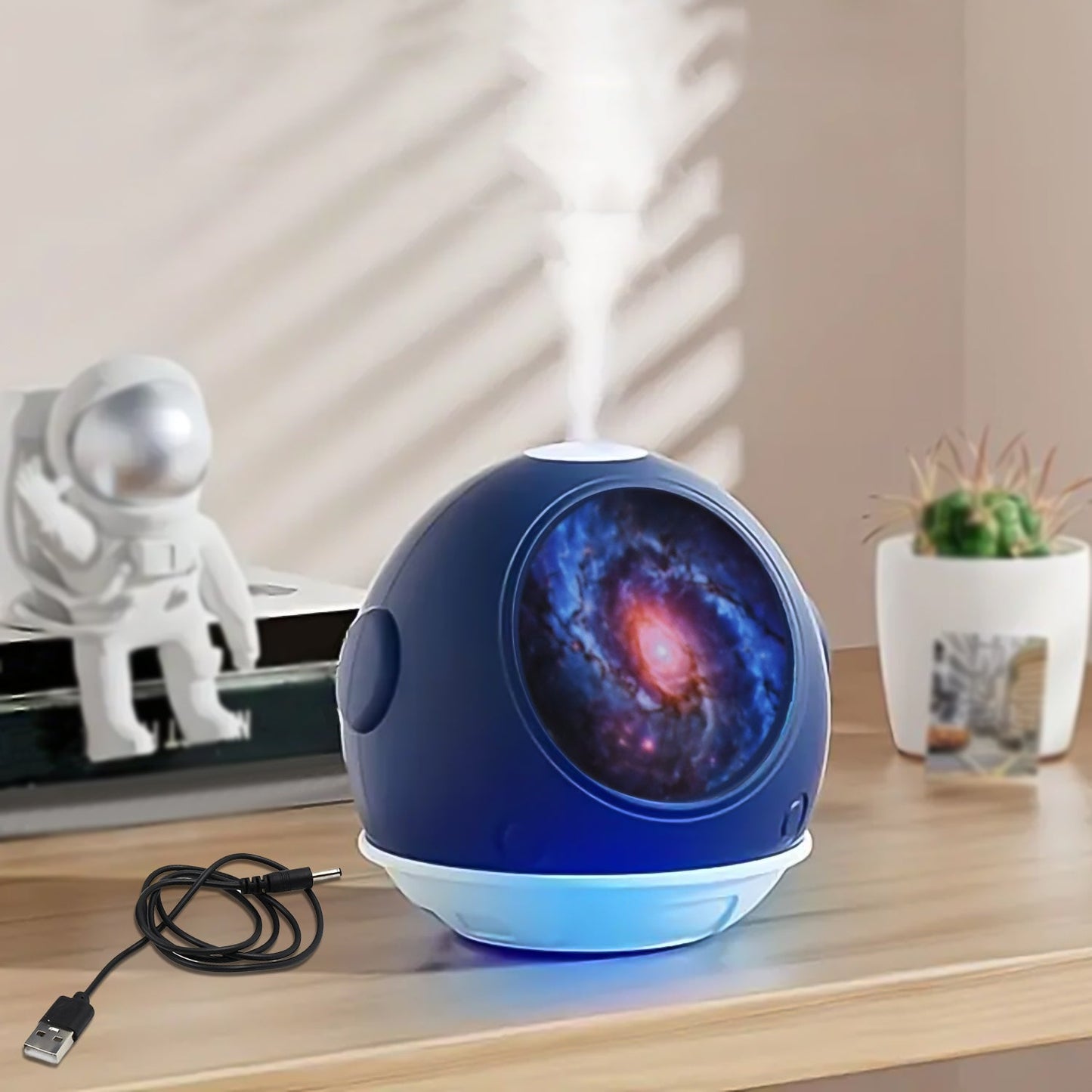 Astronaut humidifier for home in blue with galaxy design and USB power for a relaxing atmosphere
