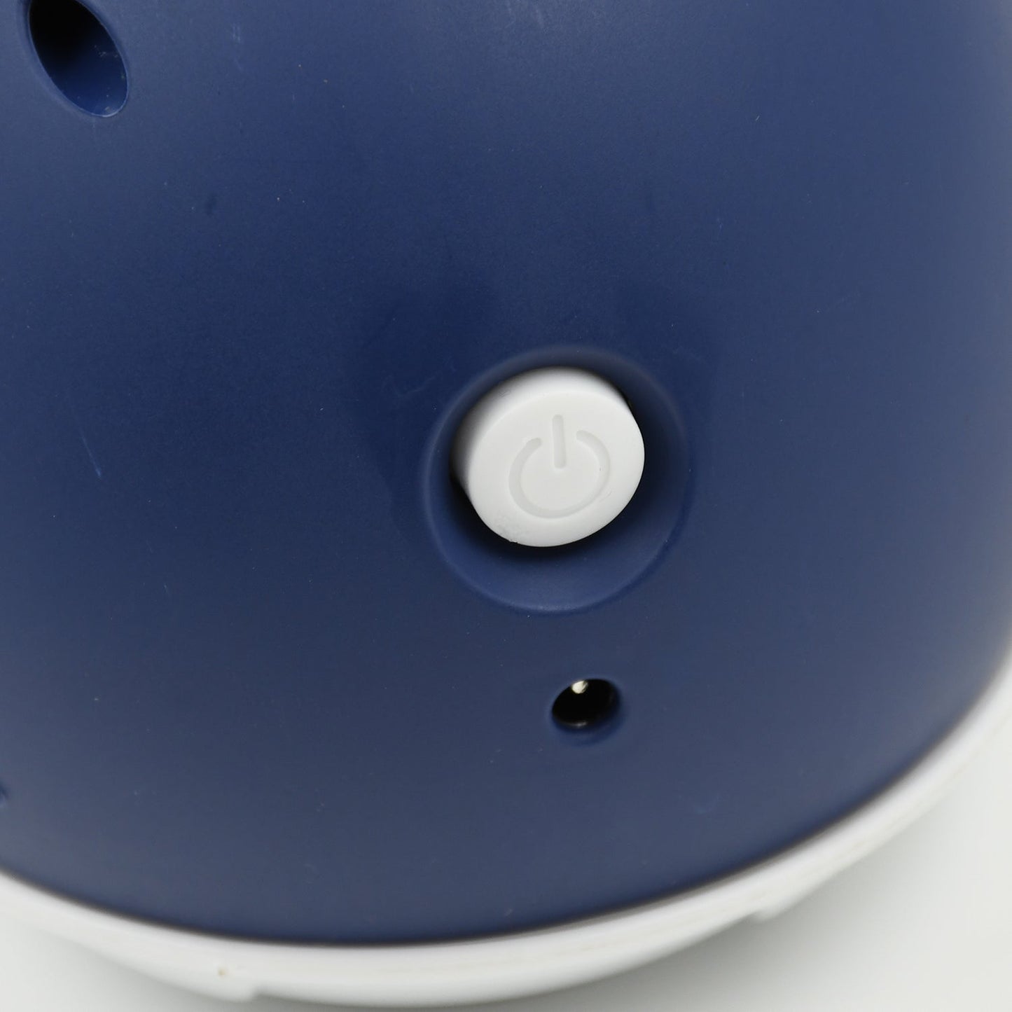 Navy astronaut humidifier for home with power button and sleek design for a stylish interior