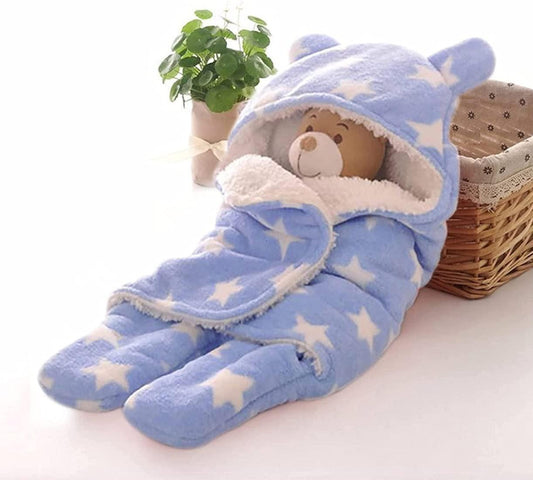 Baby wearable blanket in blue with star patterns designed for warmth and comfort