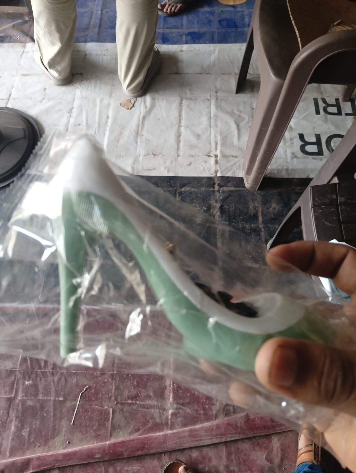 THE GIR FARMER mint green high heel sandal shaped soap holder in plastic packaging held by hand