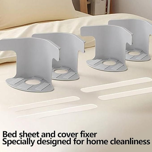 Gray bed sheet grippers for corners set on a beige bed to secure sheets and covers