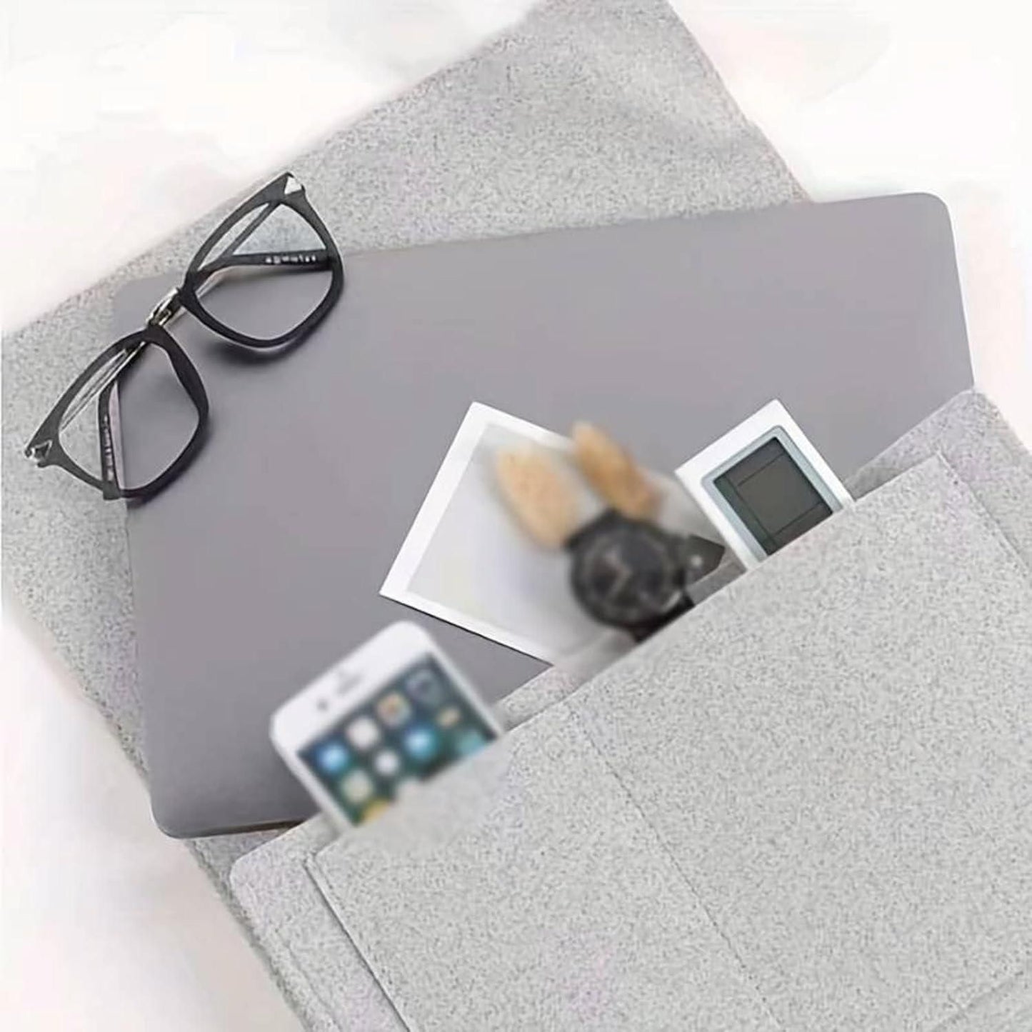 Gray bedside pocket organizer for essentials holding phone glasses and small items from THE GIR FARMER
