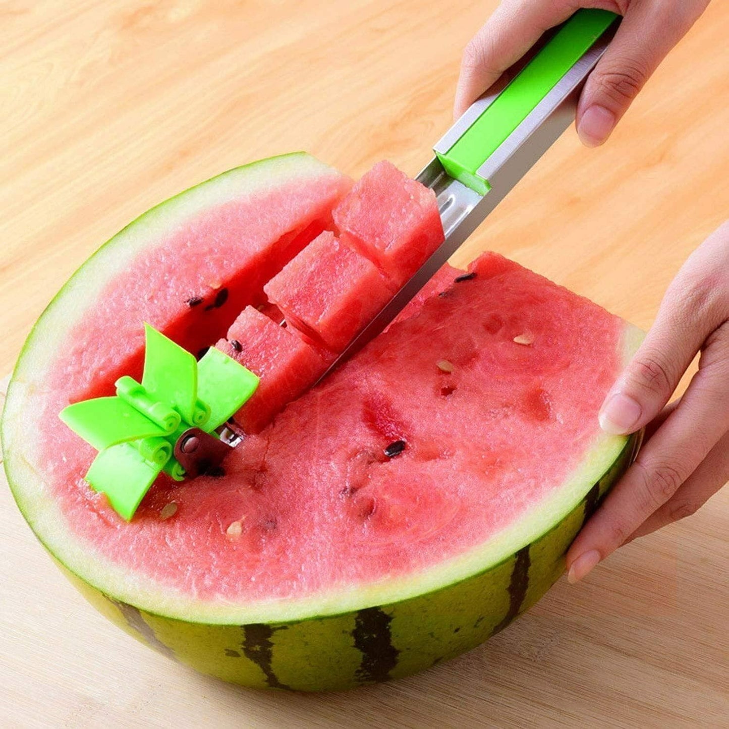 Best tool for slicing watermelon with green handle efficiently cutting watermelon into cubes