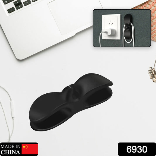 Black appliance cable organizer designed to keep cords tidy and accessible on any surface