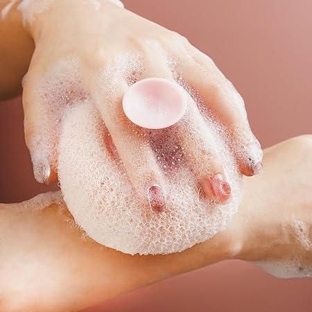 THE GIR FARMER body exfoliating scrub shower tool creating rich foam on hands and foot