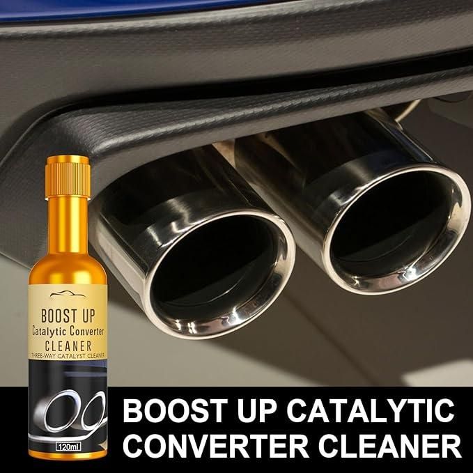 Boost Up Catalytic Converter Cleaner bottle beside shiny car exhaust tips fuel injector cleaner for cars