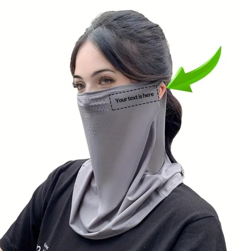 Woman wearing a breathable neck length mouth mask in gray for comfort and protection outdoors