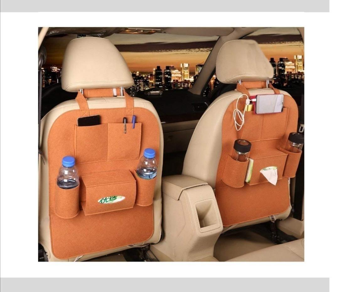 The Gir Farmer back seat storage bag for cars in brown with multiple compartments holding bottles and accessories