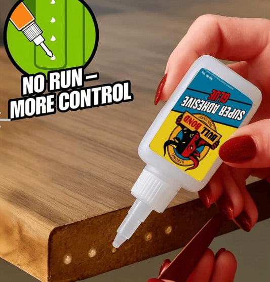 Hand applying super adhesive bottle to wood corner demonstrating strong bonding glue for home use