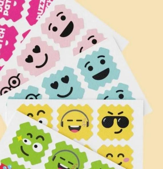 Colorful safe mosquito repellent patches for babies with various smiley face designs from The Gir Farmer