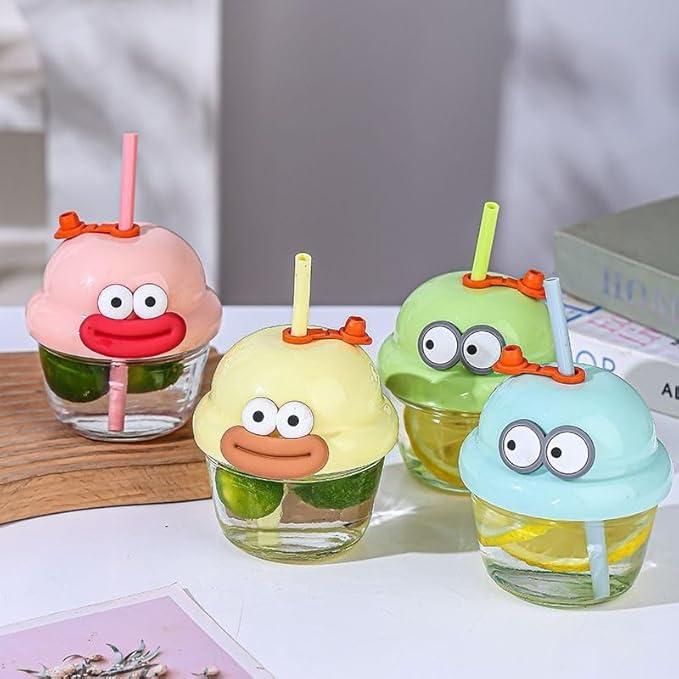 Colorful cartoon glass cup for kids with fun character designs and straws for a playful drink experience