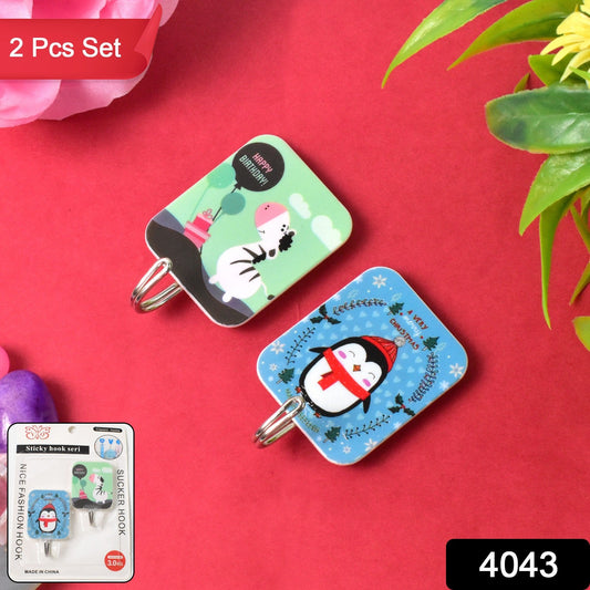 Set of 2 cartoon self-adhesive hooks featuring playful designs for easy organization