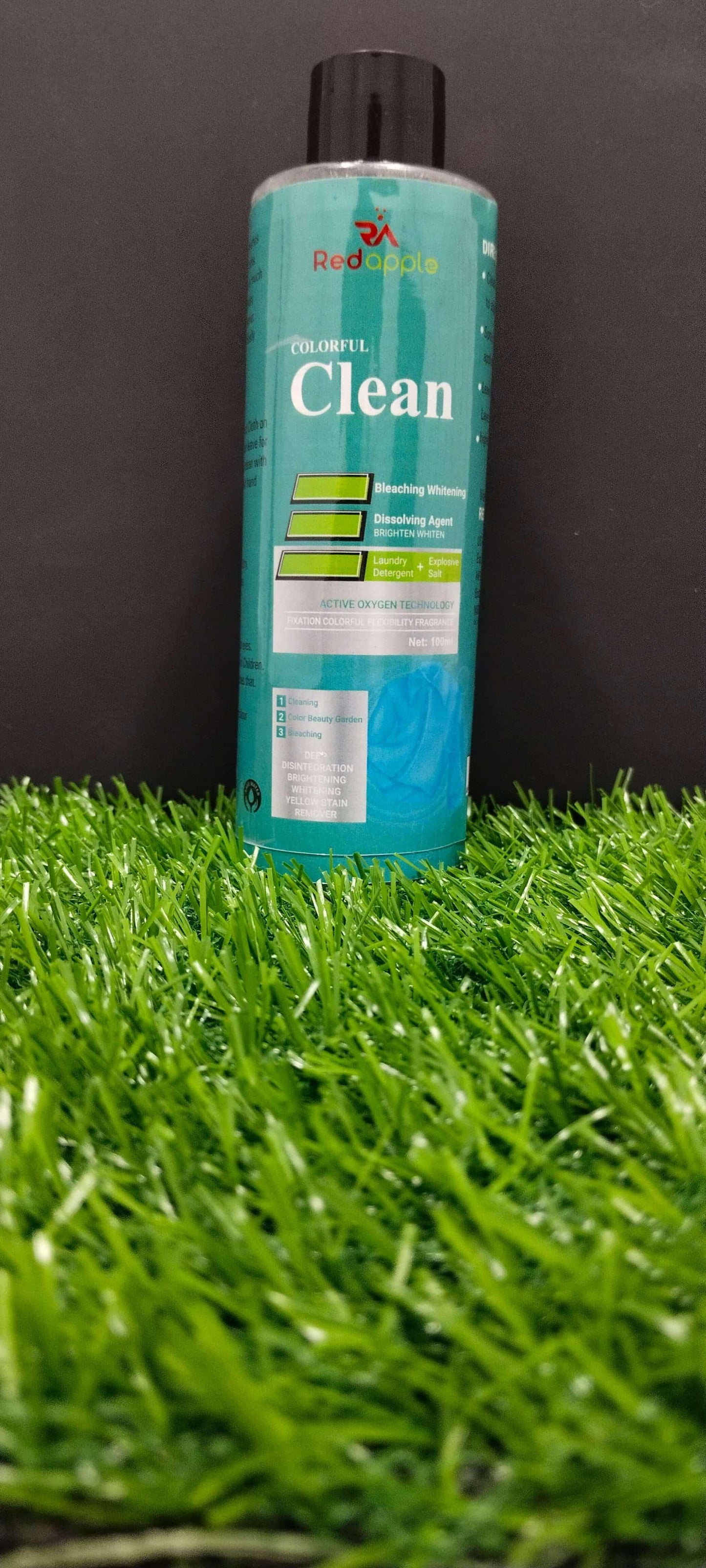 The Gir Farmer gentle stain remover for clothes in a blue and green bottle with black cap
