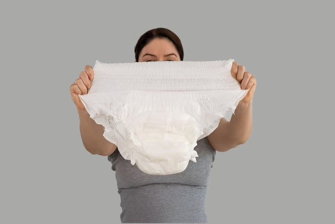 The Gir Farmer comfortable adult diapers for seniors shown in a person's hands, highlighting soft material and fit