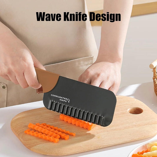Crinkled chopper kitchen tool with wave knife design cutting crinkle carrots on wooden board