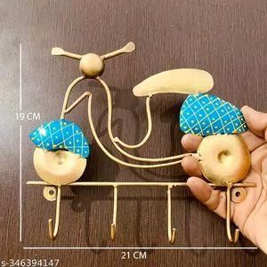 Decorative wall key holder with blue and gold bicycle design and four hooks for hanging keys