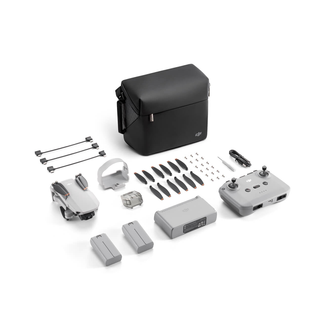DJI Mini 2 SE drone combo including camera, remote, batteries, and accessories in a carrying case