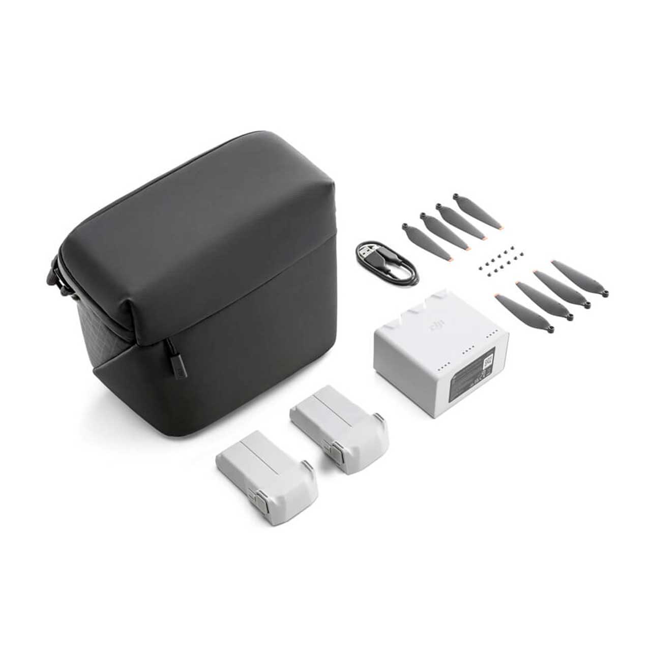 Complete set of DJI Mini 3 Pro accessories including carrying case, batteries, and extra propellers