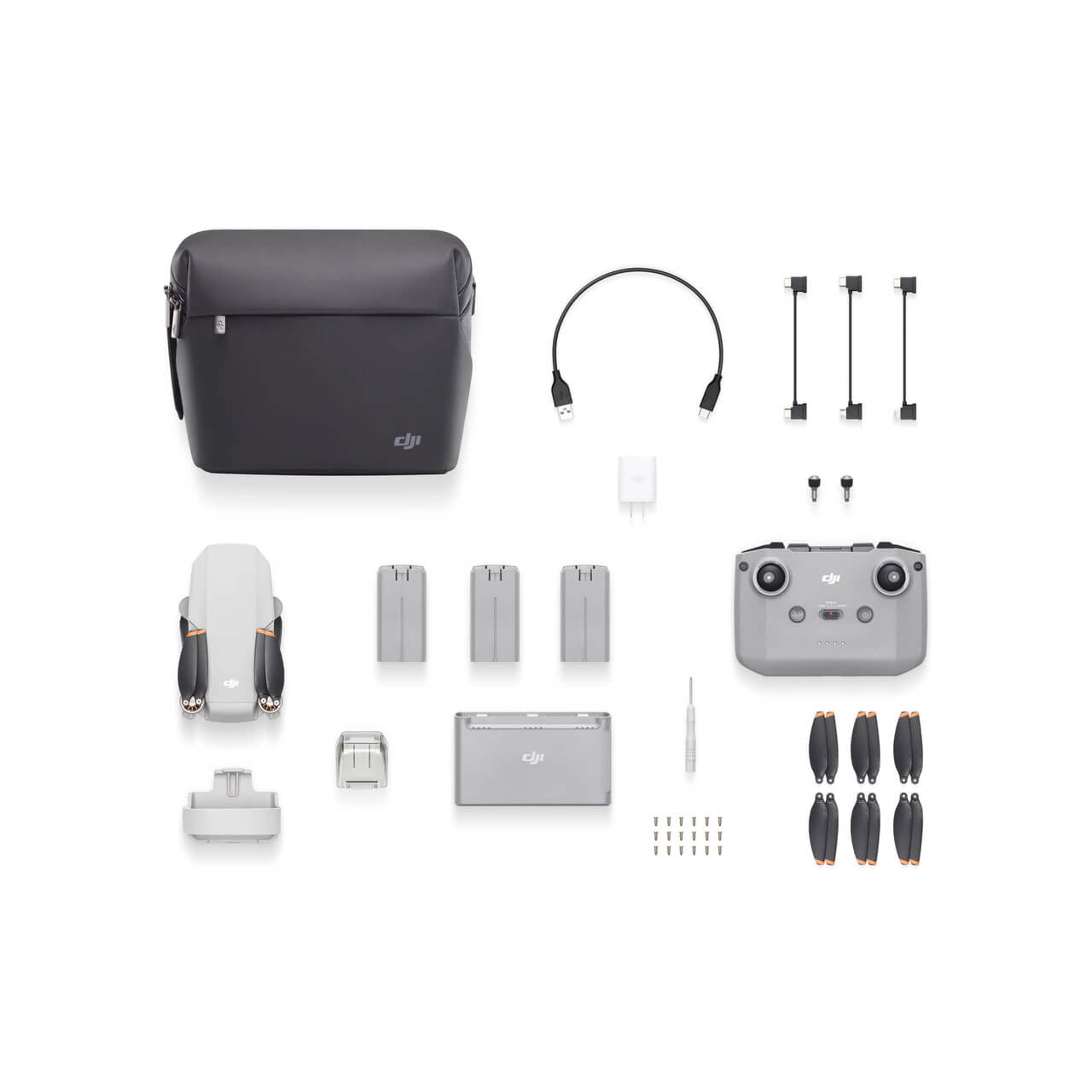 DJI Mini SE drone combo with accessories including controller, batteries, and carrying case