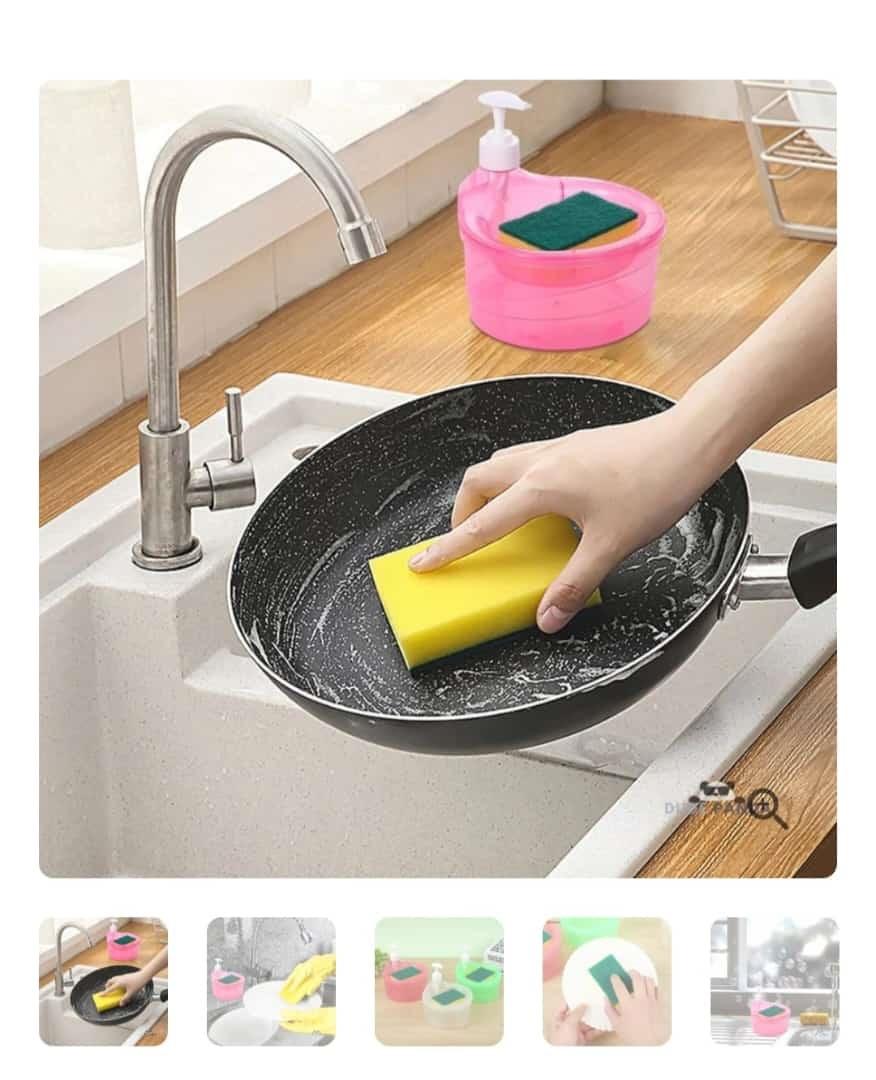 Pink liquid soap dispenser for dishwashing with scrubber holder on kitchen sink countertop