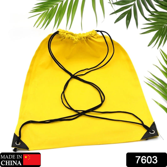 Bright yellow drawstring sport bag for gym with adjustable cords and durable design