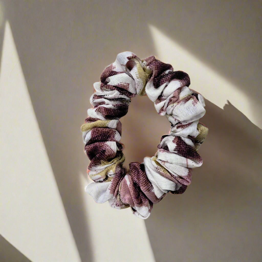 Gir Farmer durable printed hair accessories featuring a fabric scrunchie with a brown and white pattern