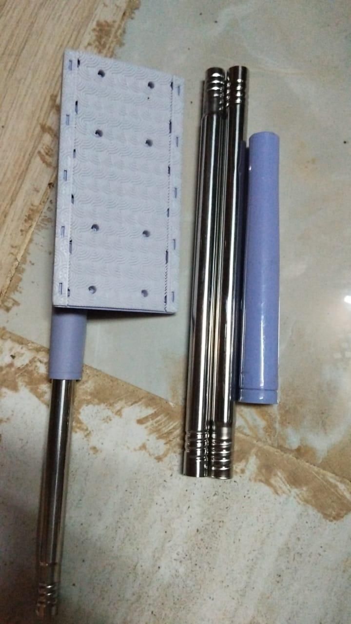 Easy clean mini mop with detachable handle and cleaning head for convenient home use