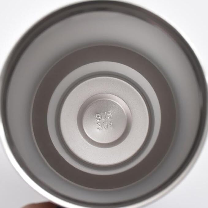 Top view inside insulated sipper bottle with straw showing stainless steel SUS 304 base interior