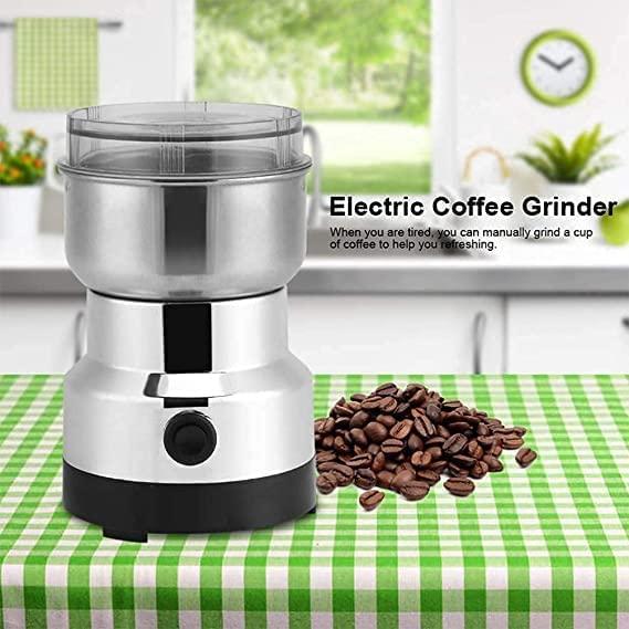 THE GIR FARMER portable coffee bean grinder electric with stainless steel body and coffee beans on green checkered table