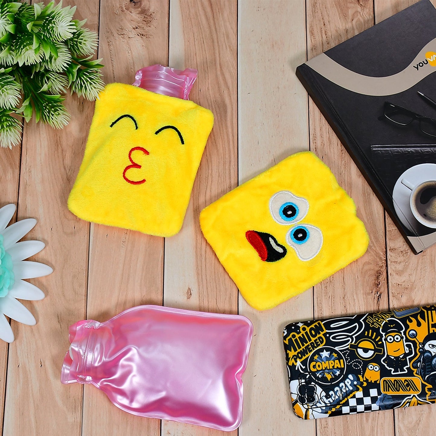 Emoji mini hot water bag in yellow with cute designs for relaxation and comfort