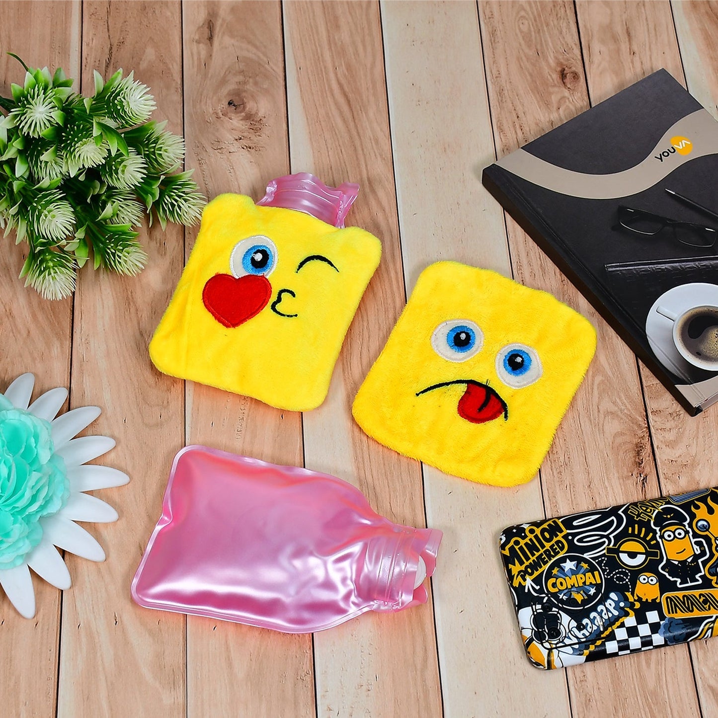 Emoji mini hot water bag in yellow with playful expressions, perfect for warmth and comfort