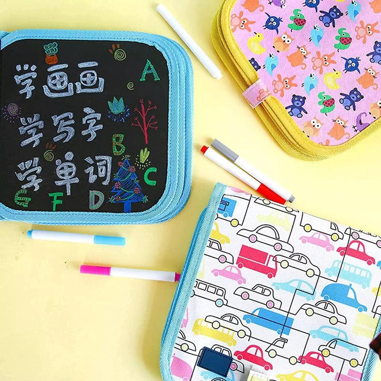 Colorful erasable doodle slate for kids with assorted designs and markers included for creative fun