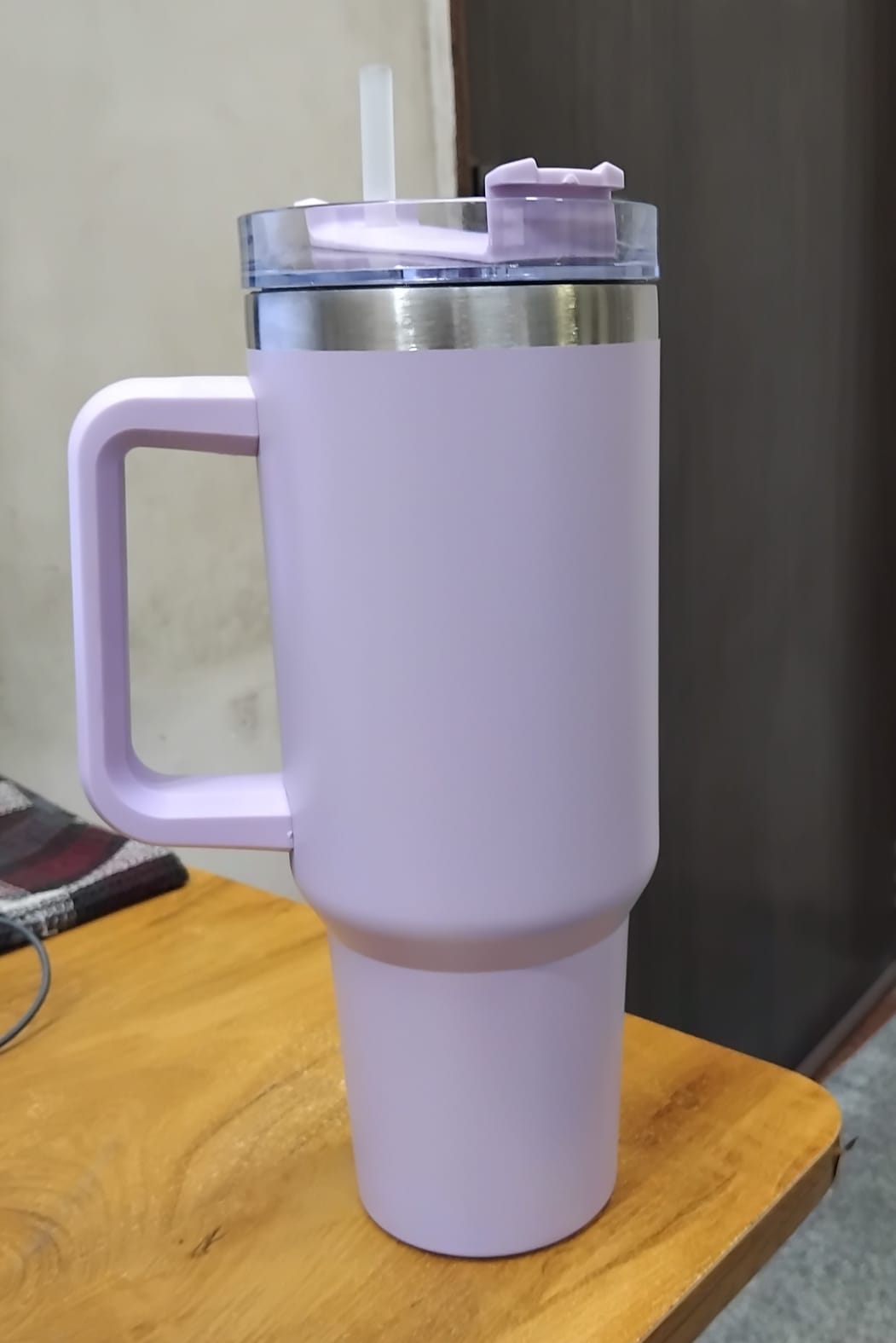 The Gir Farmer lavender insulated sipper bottle with straw and handle stainless steel rim clear lid
