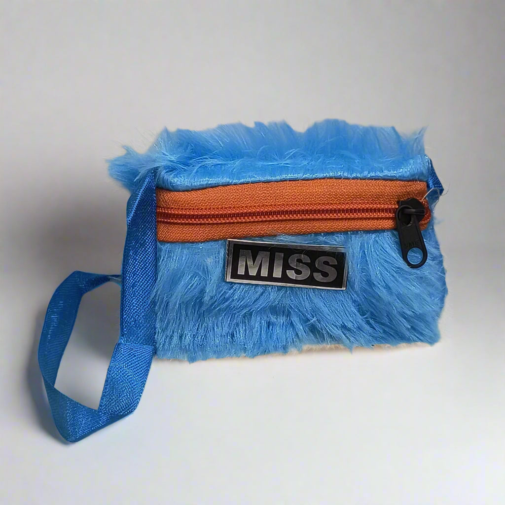 Blue fashionable fur shoulder bag for girls with orange zipper and wrist strap by Amd-Deodap