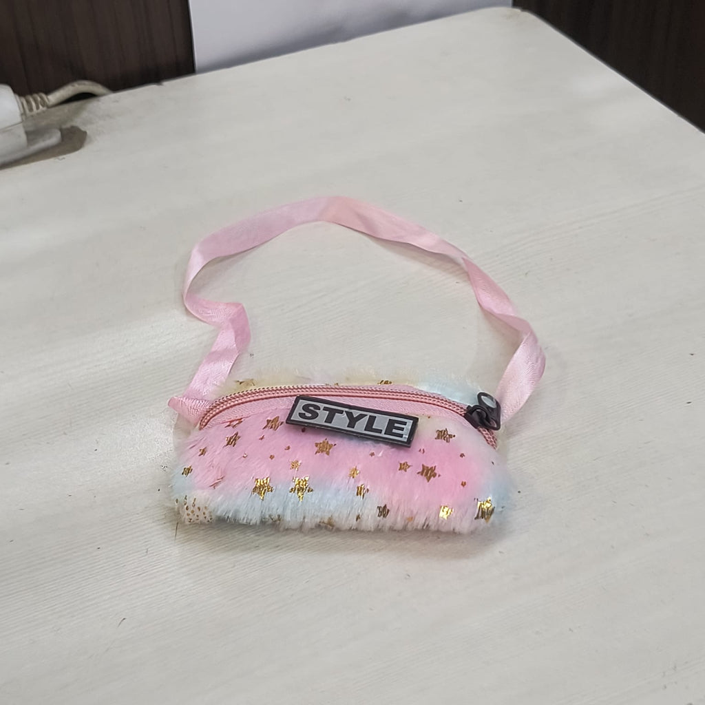 Fashionable fur shoulder bag for girls in pink with gold stars and a STYLE patch