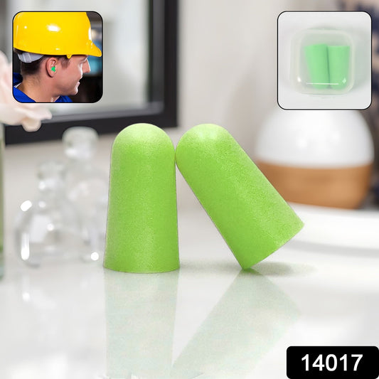Green foam earplugs for noise reduction displayed on a table with a person wearing a hard hat