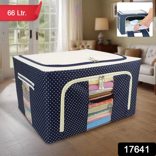 Foldable steel frame storage bag in navy polka dots with clear front pocket for easy organization