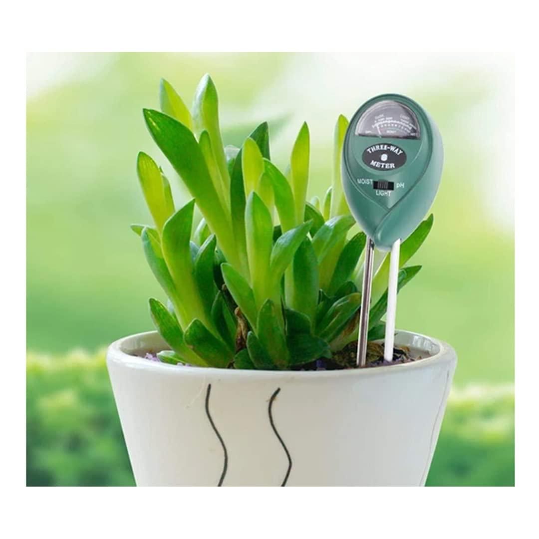 Garden soil tester for home use inserted in white pot with green succulent plant by The Gir Farmer