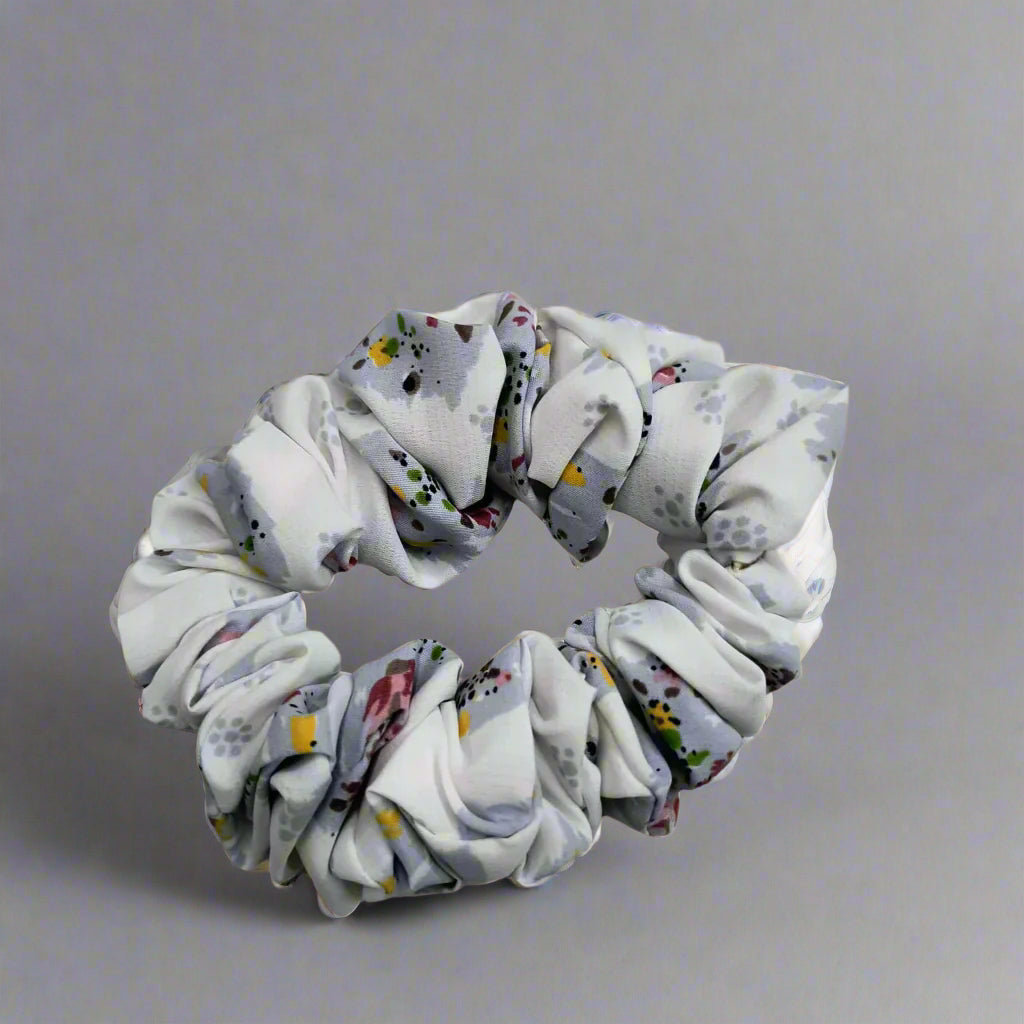 Gentle elastic hair rope for women in white with colorful abstract patterns