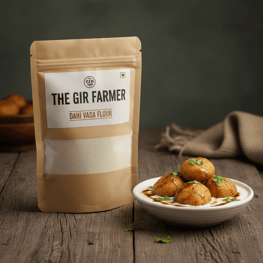 THE GIR FARMER Organic Dahi Vada Flour in a brown bag with crispy vadas served on a plate