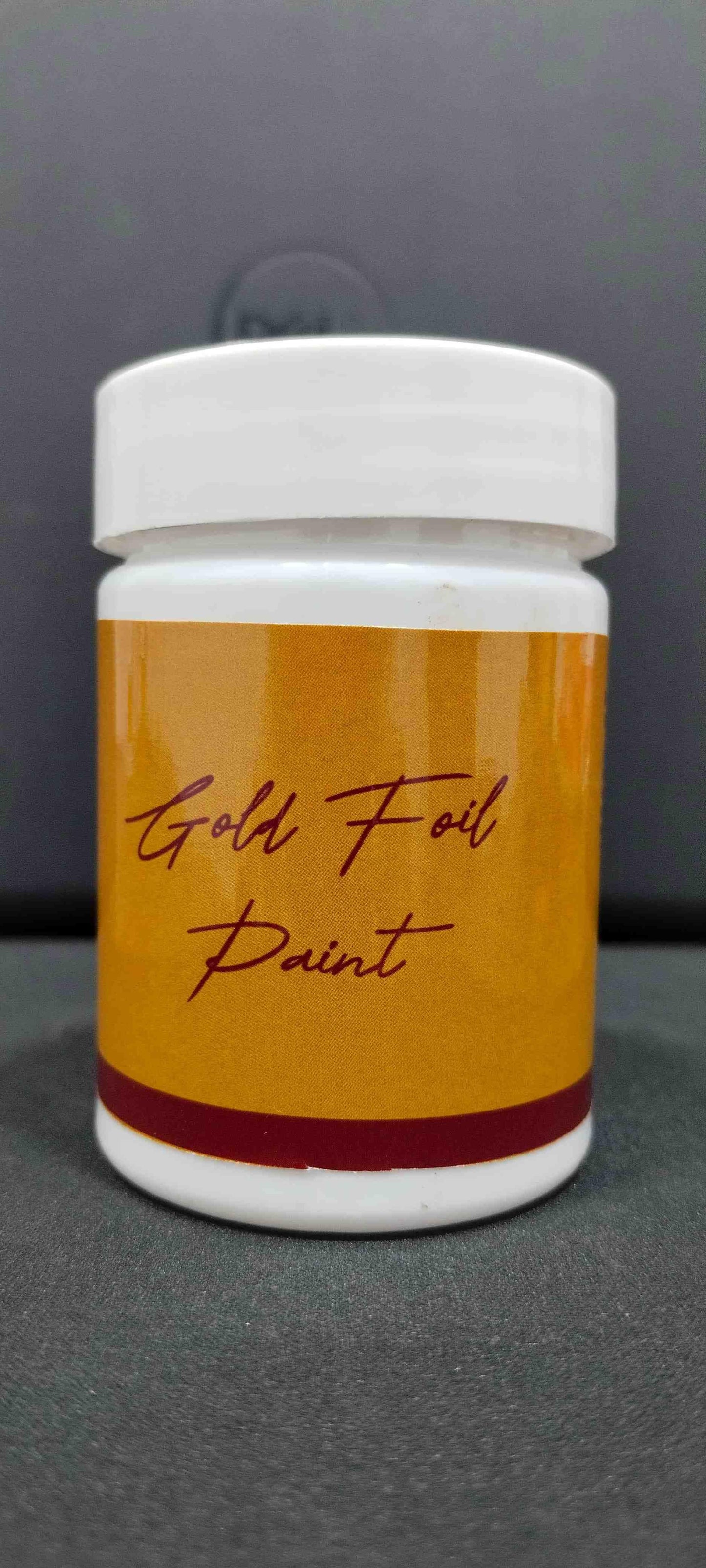 THE GIR FARMER white jar labeled Gold Foil Paint showing water-based glitter bronzing paint for crafts