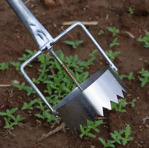 The Gir Farmer greenhouse film punch tool with a sharp metal blade for creating holes in greenhouse film
