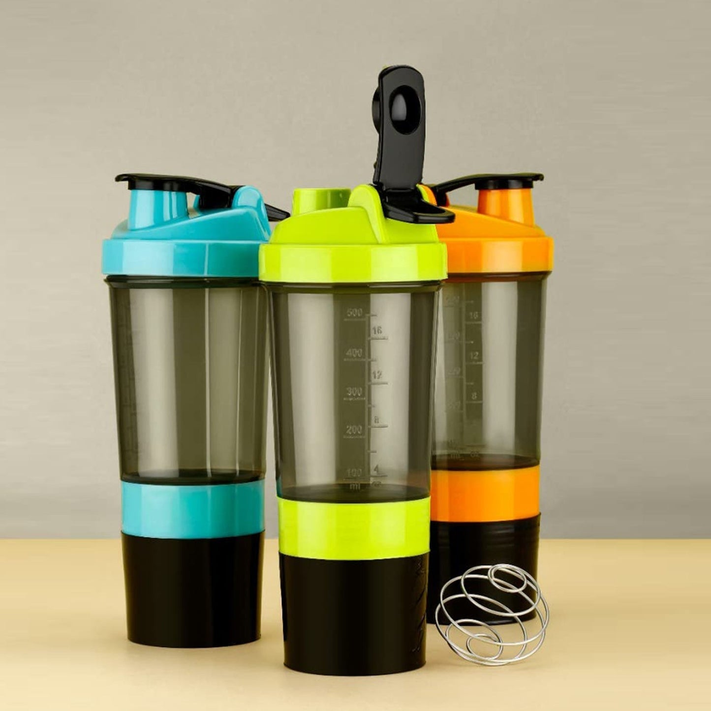 The best protein shaker for workout by The Gir Farmer in blue green and orange with mixing ball