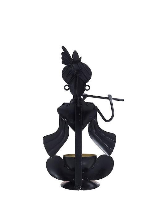 Handcrafted Krishna statue for home depicting Krishna playing the flute in a black metal design