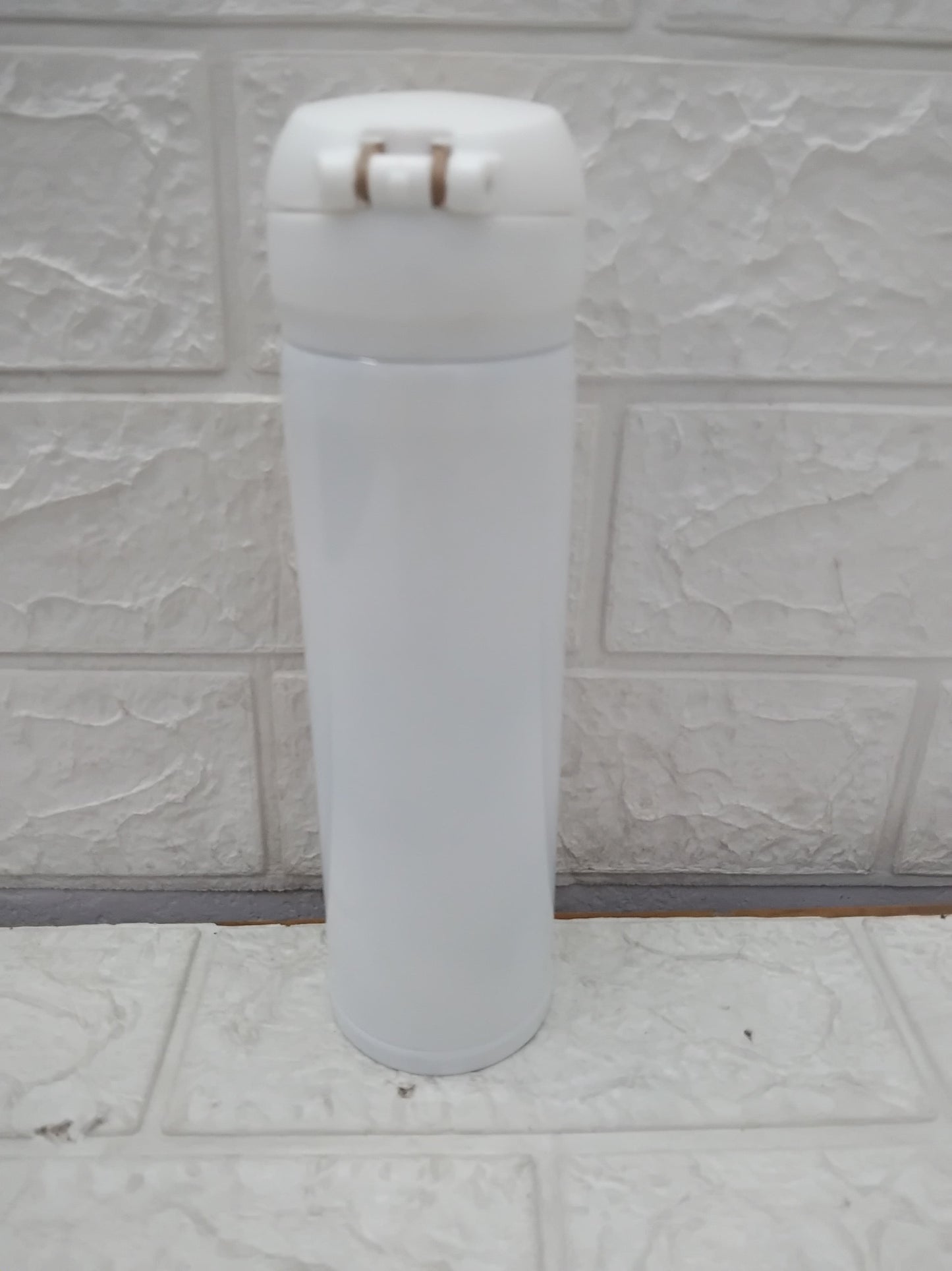 White SS insulated stainless steel kitty water bottle with secure flip-top lid by THE GIR FARMER