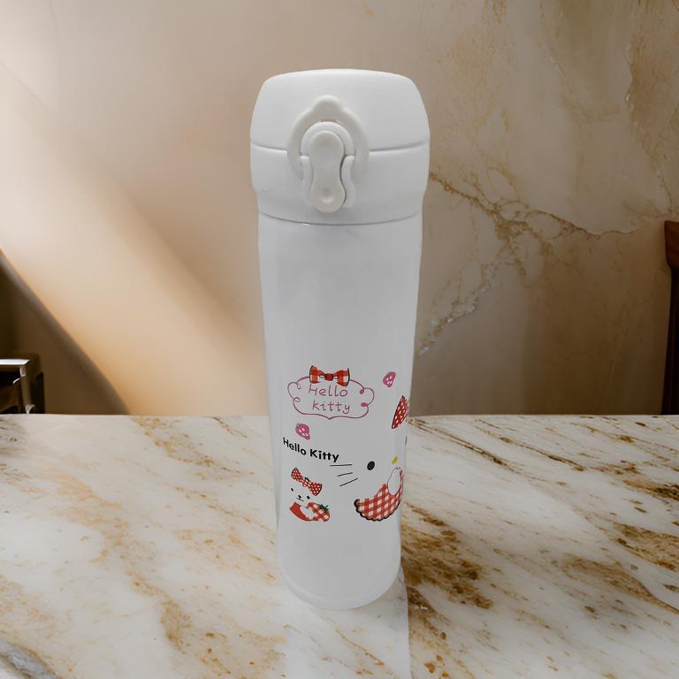 White SS insulated stainless steel kitty water bottle with Hello Kitty design on marble surface
